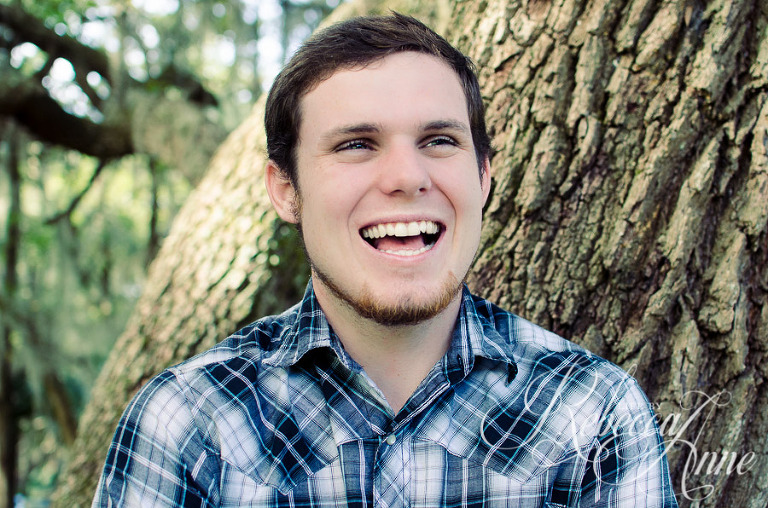country, boy, man, plaid, smile, laugh, tree, leaning on tree